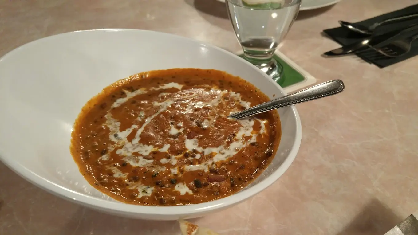 Signature Butter Chicken Edmonton - creamy texture and rich flavorful sauce at Swagat India Bar & Bistro consistent favorite